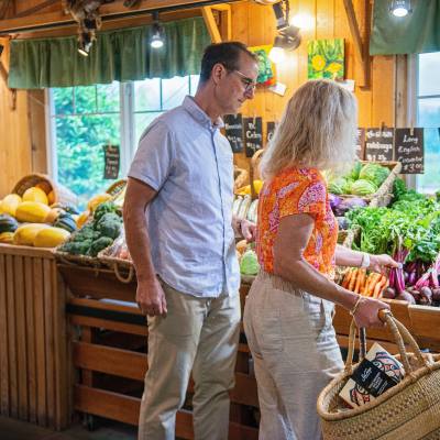 A couple looks at an array of produce at Silver Meadows Farm.