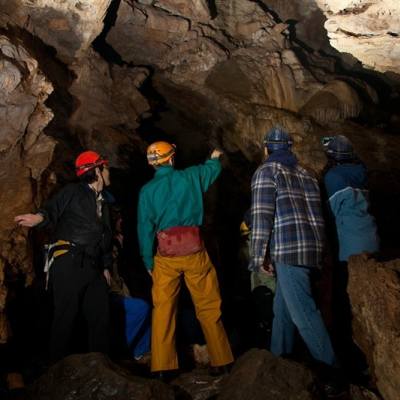 A group touring Horne Lake Caves on Vancouver Island.