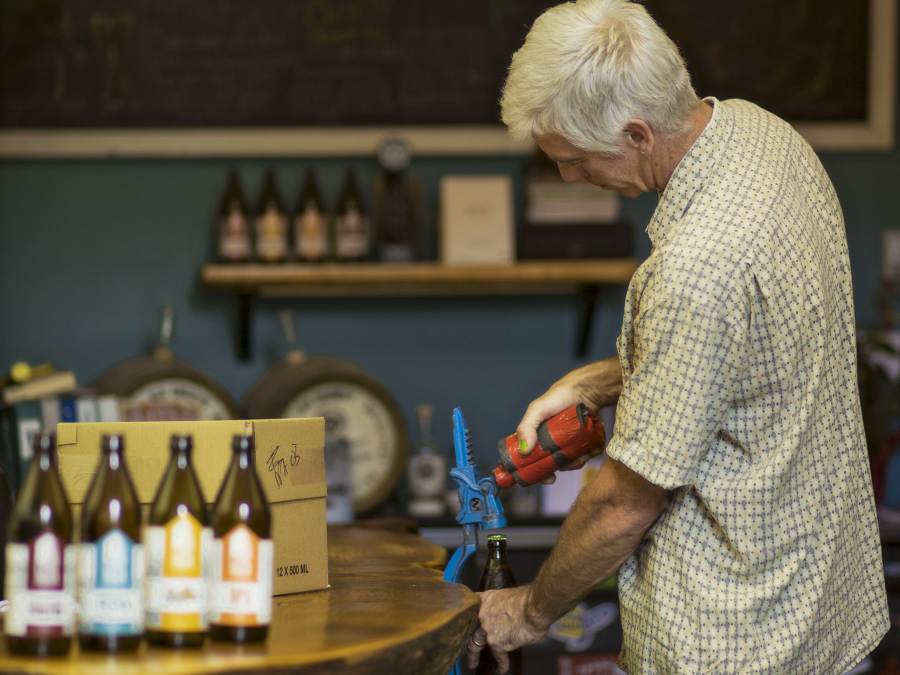 Dave Paul, owner of LoveShack Libations, bottling freshly brewed beer