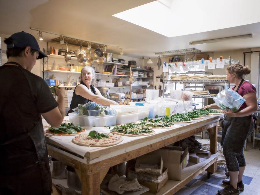 artisans working in the kitchen at Wild Culture Bakery