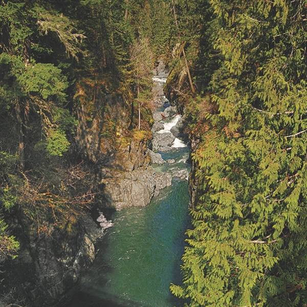 Clear waters at the bottom of the lower falls at Englishman River Falls Provincial Park