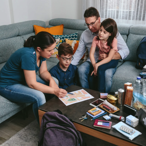 family reviewing an emergency plan together in case of natural disaster or emergency in PQN Vancouver Island