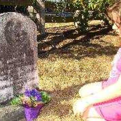 Child kneeling at St. Anne's Anglican Church