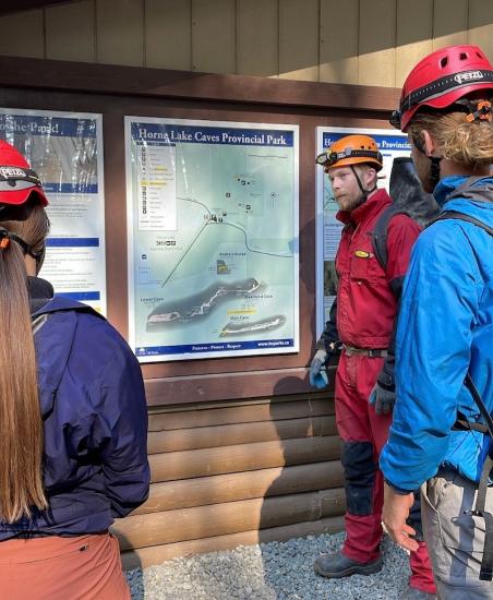 Horne Lake Caves Tour Guide giving a group an into to the park