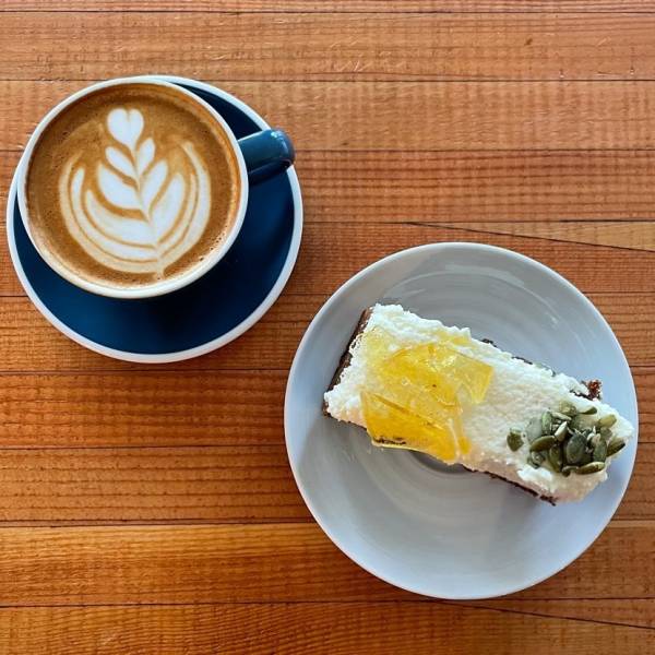 Latte and fresh-baked treat from French Press Coffee Roasters, Qualicum Beach - Image: @frenchpresscoffeeroasters